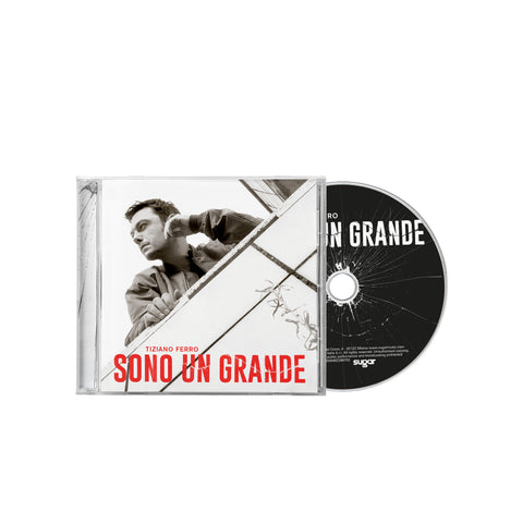 Album Sono un grande di Tiziano Ferro nel formato cd in colorazione rossa con poster autografato, musica pop 