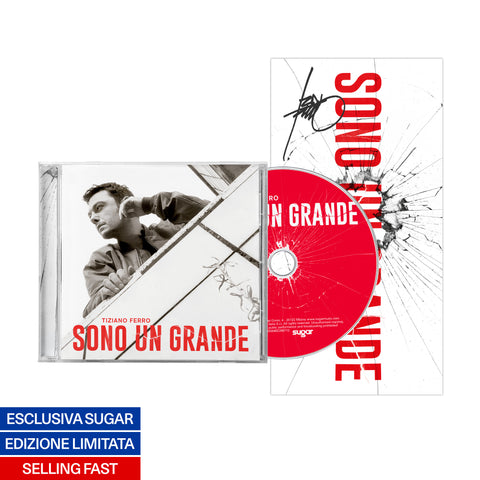 Album Sono un grande di Tiziano Ferro nel formato cd in colorazione rossa con poster autografato, musica pop 